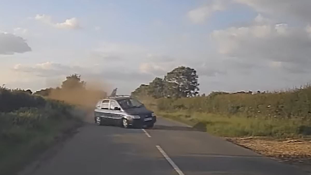 Moment reckless drink driver swerves off a quiet country road before colliding with a police car