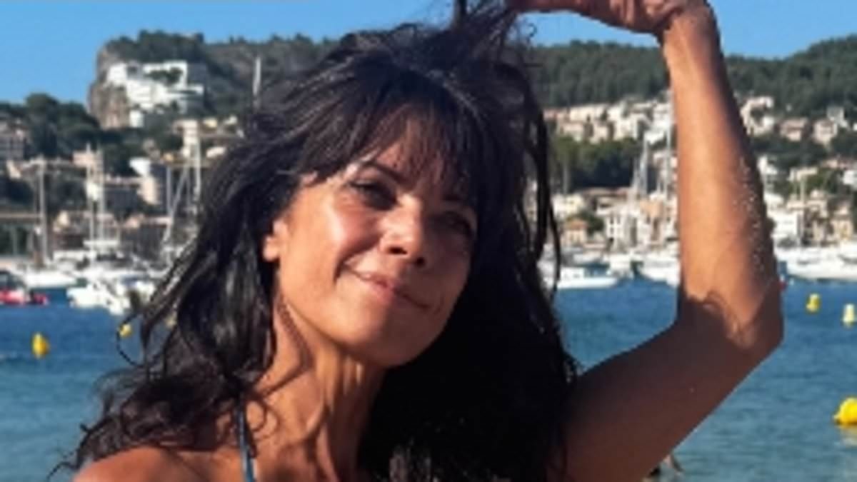 Jenny Powell, 57, shows off her age-defying figure in a blue bikini as she enjoys beach day during sun-soaked Spain getaway