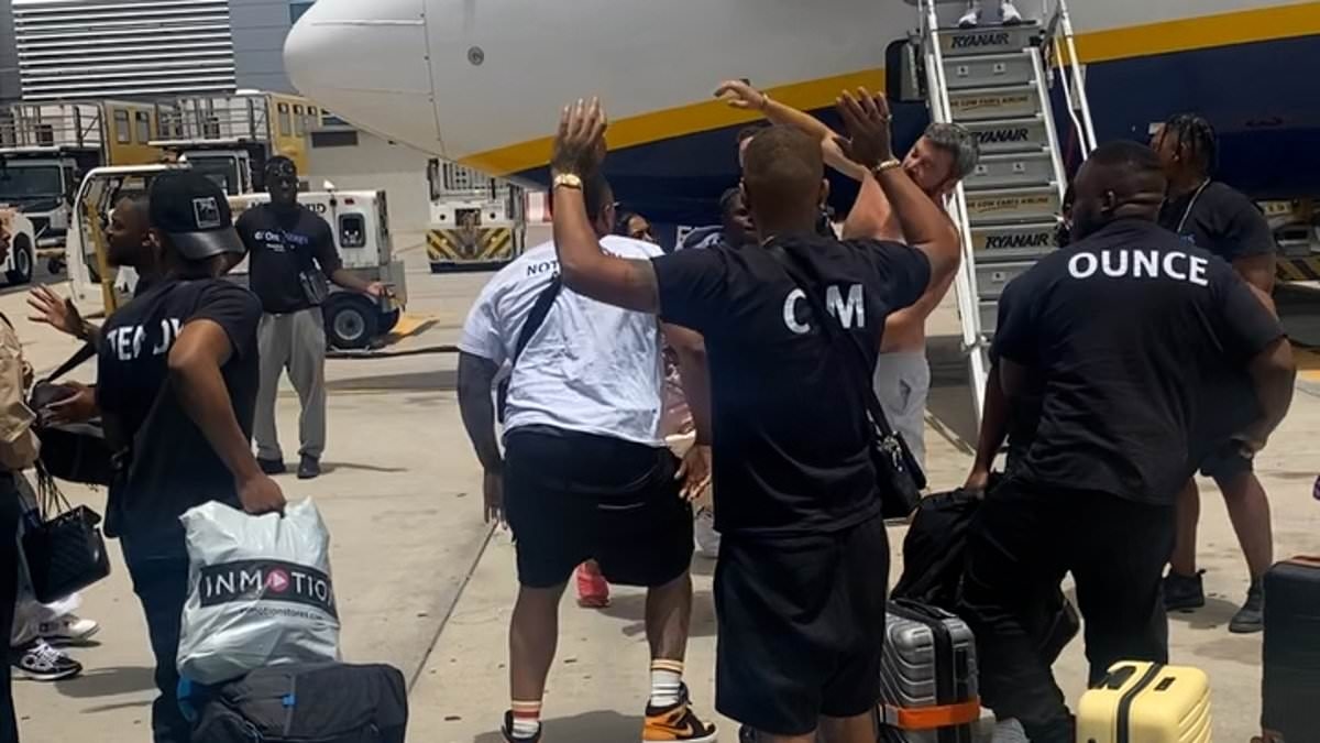 Moment fists fly as British stag do erupts into brawl just after landing at Tenerife airport following onboard row