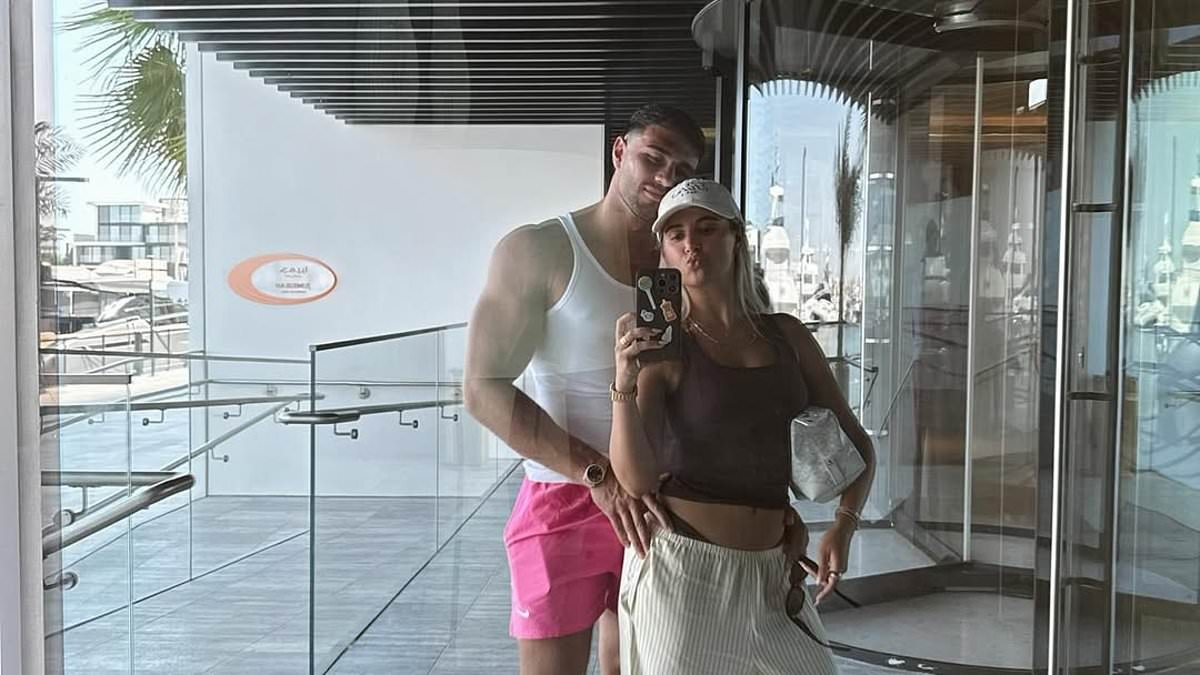 Tommy Fury puts on a loved-up display with Molly-Mae Hague and poses for sweet snaps with their daughter Bambi as he gushes about his 'lucky life'