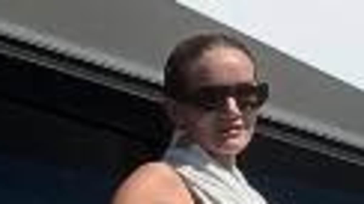 Rosie Huntington-Whiteley goes topless in racy snap as she enjoys lavish yacht trip around the coast of Italy with her fiancé Jason Statham and their children