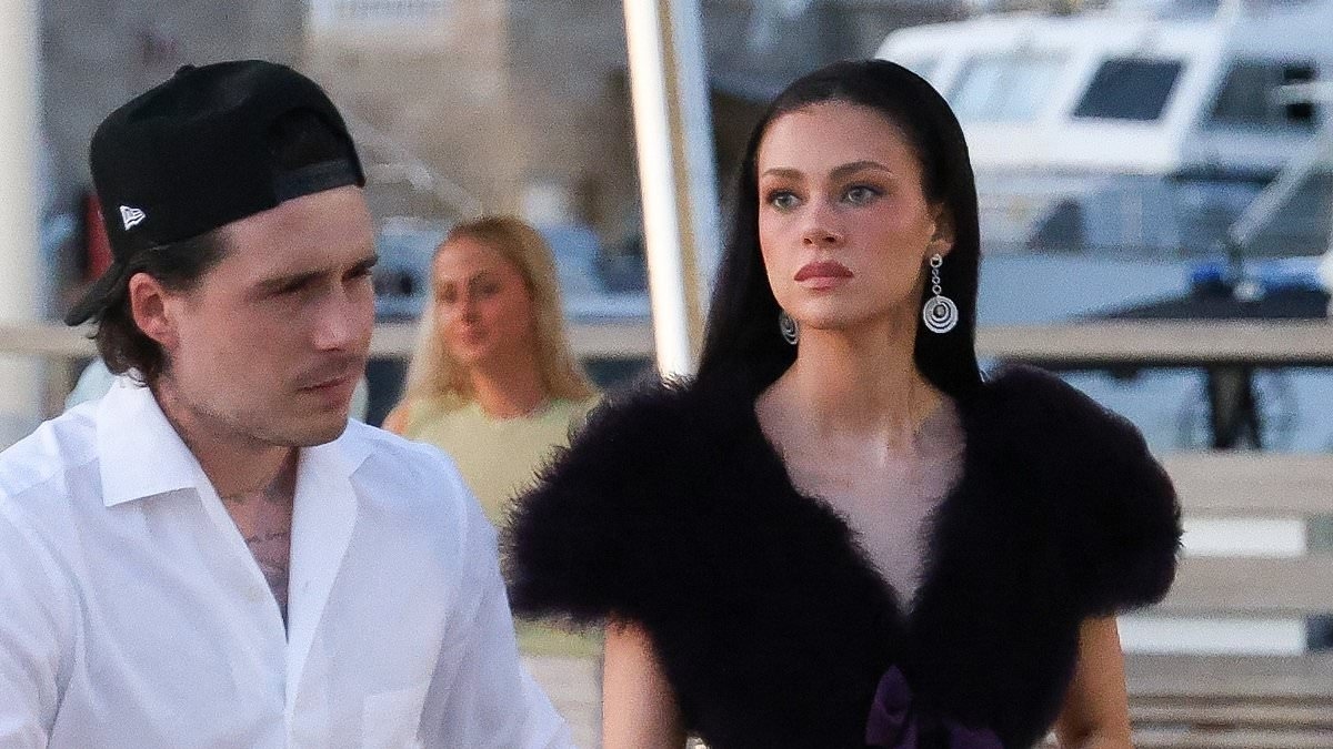 Nicola Peltz appears strained as she steps out with husband Brooklyn Beckham in sun-soaked St Tropez amid ongoing family feud