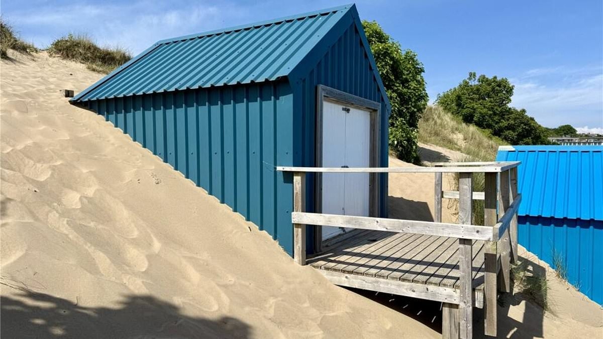 Dig this! Tiny beach hut buried deep into sand dune will set you back £150,000 - and you can't sleep there overnight