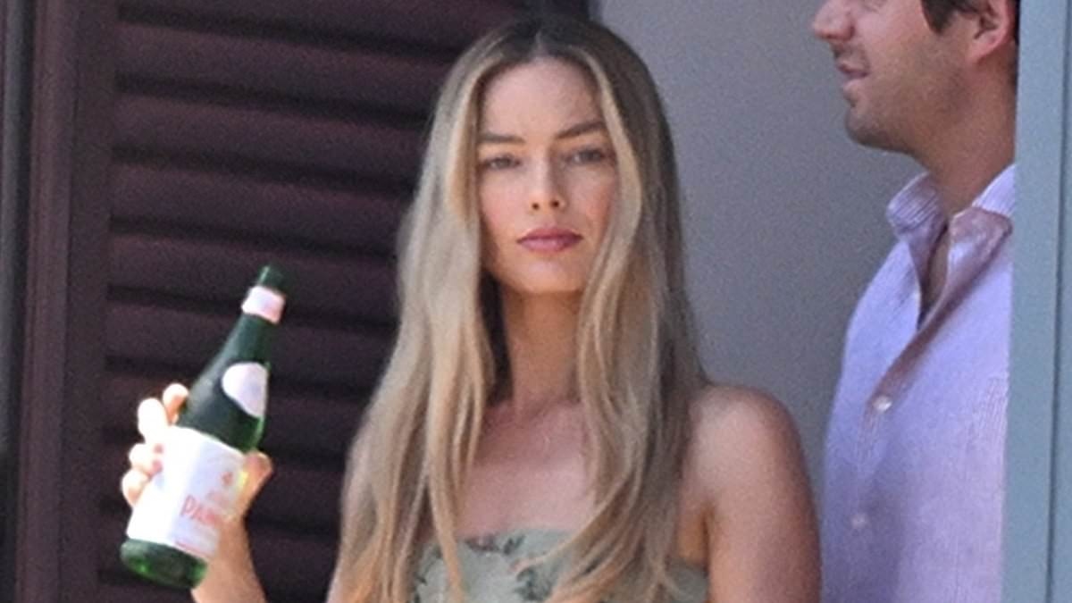 Margot Robbie packs on the PDA with husband Tom Ackerley during intimate balcony moment in Italy