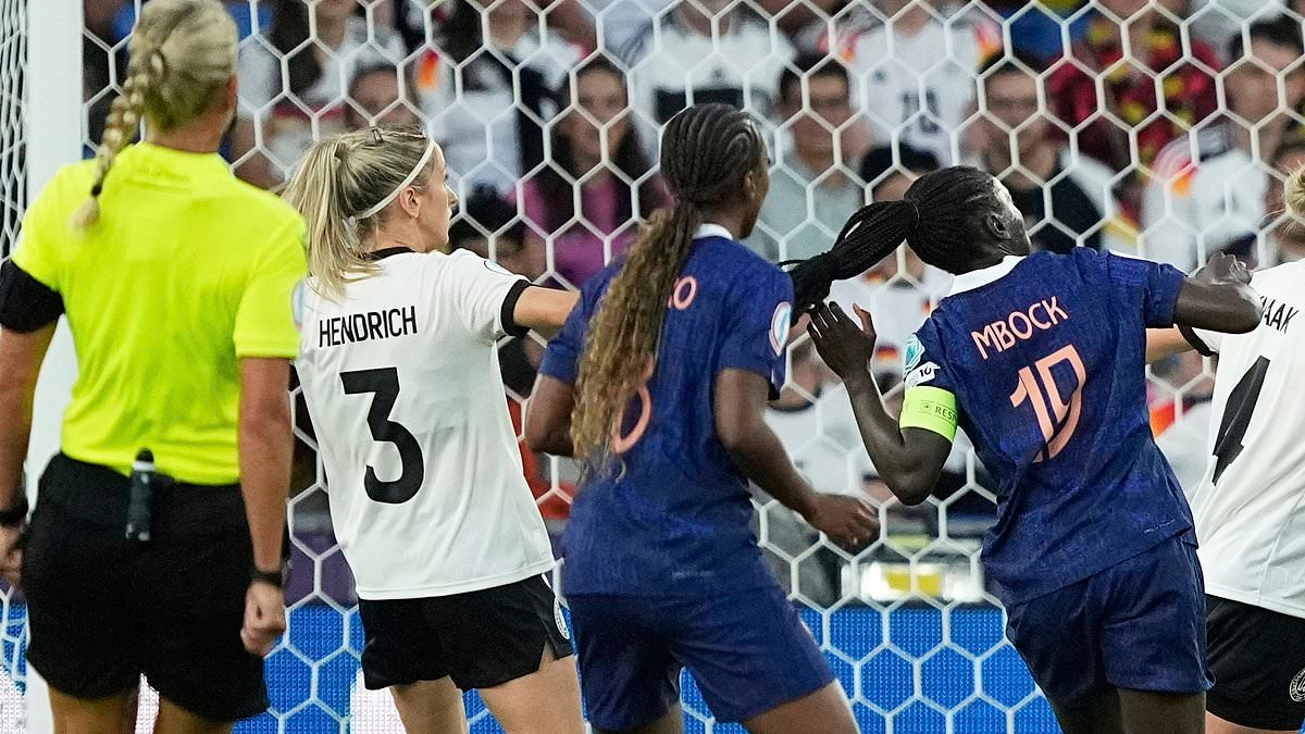 Germany star sent off for brutally pulling player's hair at Euro 2025 in bizarre incident that saw her give away a penalty