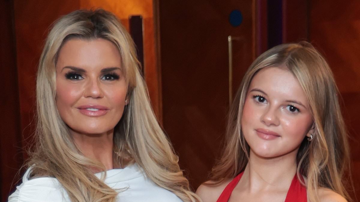 Kerry Katona, 44, wows in figure-hugging white dress as she enjoys quality time with daughter Heidi, 18, at charity event