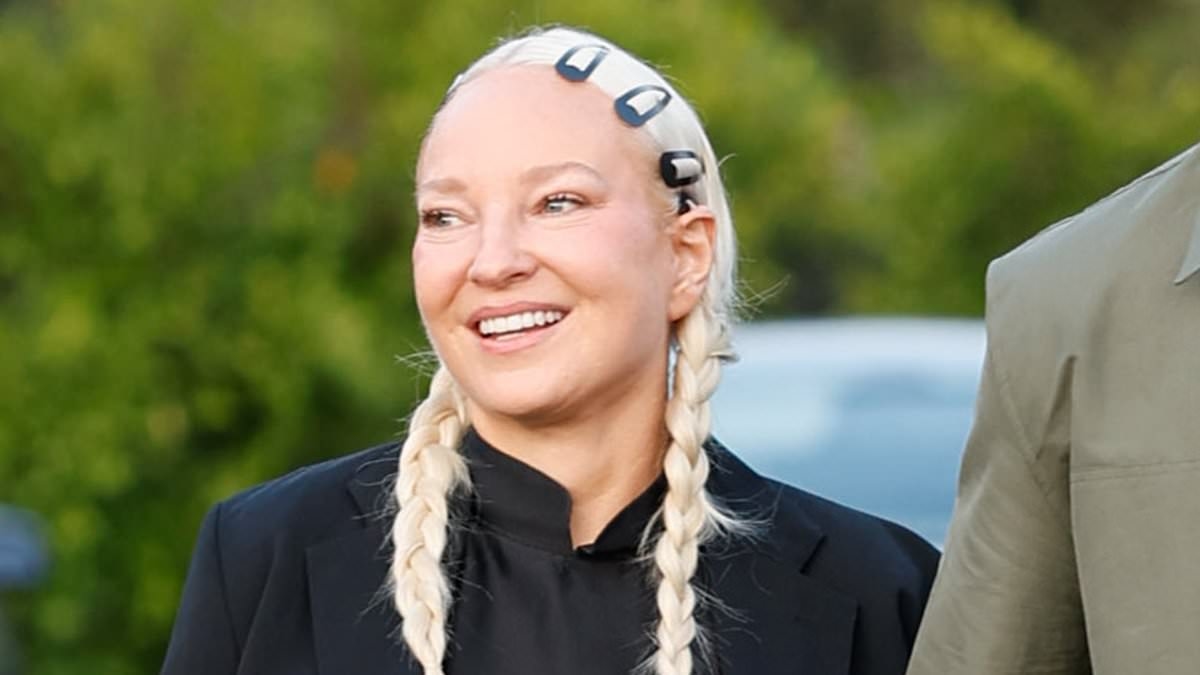 Sia, 49, sparks romance rumours with reality star, 28, as the unlikely pair are spotted hand-in-hand on LA dinner date
