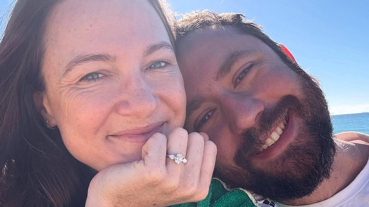 Olympic swimmer Cate Campbell announces surprise engagement to partner Adam Kerr and shows off her massive diamond ring