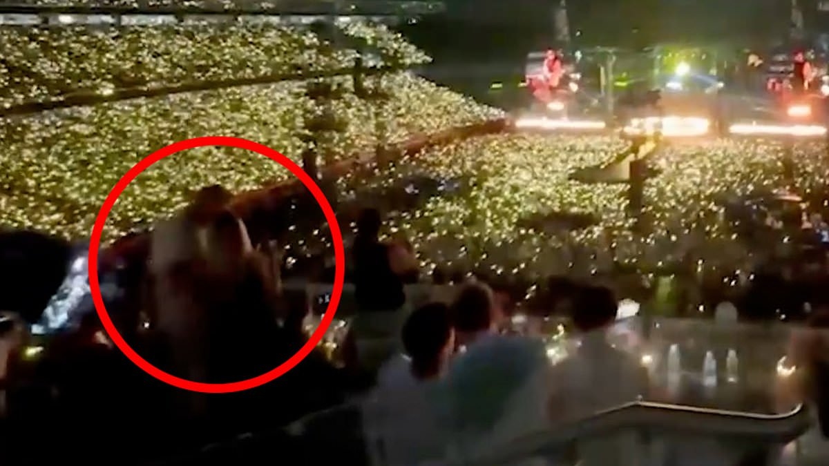 Get a room! New film of Coldplay kiss cam scandal pair Andy Byron and Kristin Cabot show they were all over each other - even before they got on band's big screen for now viral clip