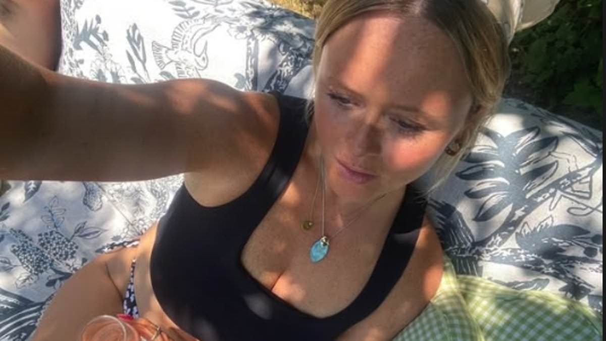 Newly-engaged Emily Atack shares stunning bikini snap as she cosies up to fiancé Alistair Garner amid romantic getaway to the sun-soaked Pyrenees