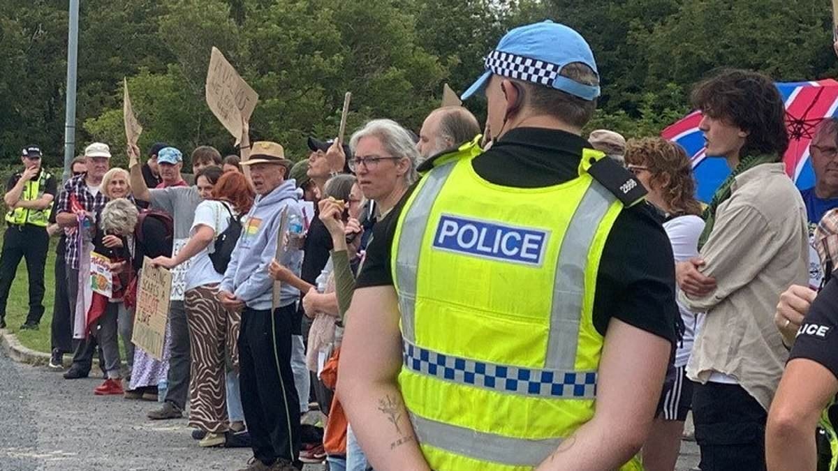 Protest outside the construction site of a controversial £2.5 million mosque sees police called as rival factions clash