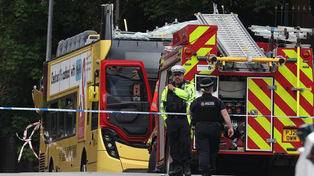 Fifteen people injured as double decker bus has roof torn off after ploughing into bridge