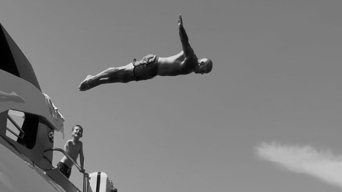 Jason Statham, 57, recreates Commonwealth Games dive on sun-soaked family holiday - 35 years on from representing England
