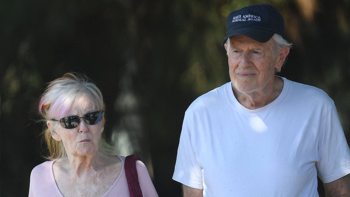70s TV icon wears bold political hat during rare outing with actress wife who famously said 'NO' to Elvis
