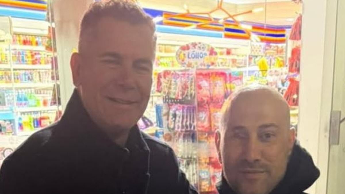 Notorious outlaw bikie Tarek Zahed shows off the gruesome injuries he suffered in assassination attempt for the first time as he takes a selfie with footy great Wayne Carey