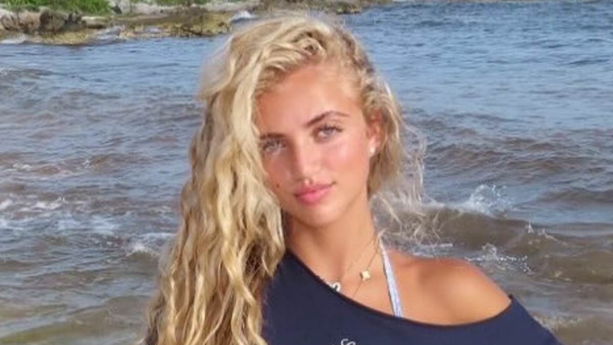 Princess Andre, 18, puts on a stylish display in off the shoulder navy top and white crochet shorts as she enjoys beach day in Mexico