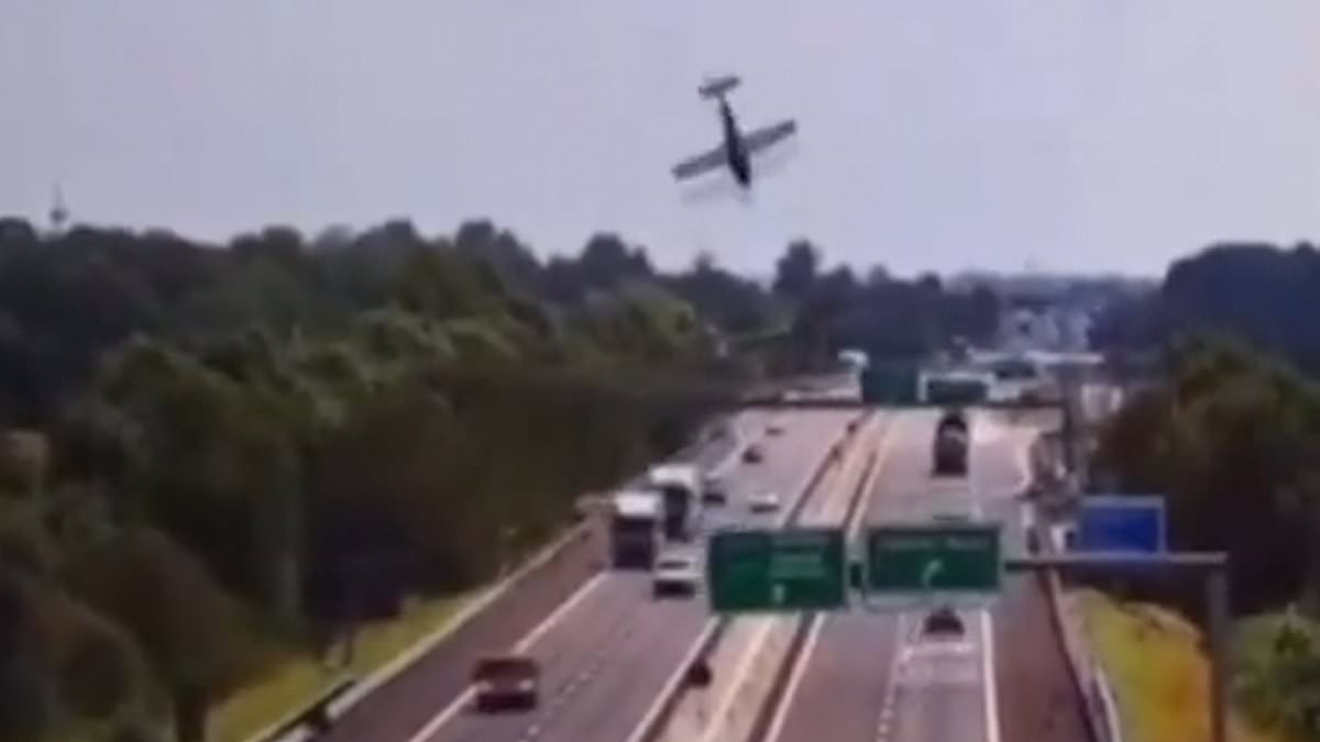 Plane crashes onto busy motorway exploding into a fireball