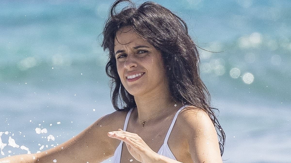 Camila Cabello sizzles in a skimpy string bikini next to her rich beau during lovefest in Ibiza