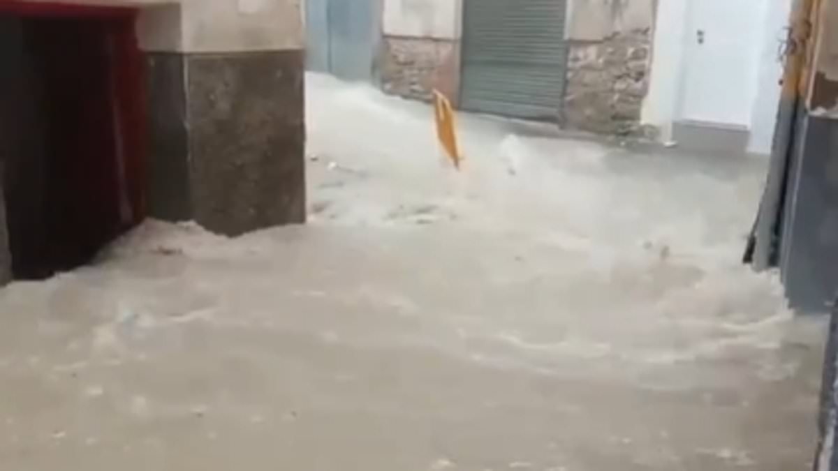 Freak storms lash Spanish tourist resorts with roads becoming raging rivers and HAIL turning streets white as Brits hide from lightning in Benidorm
