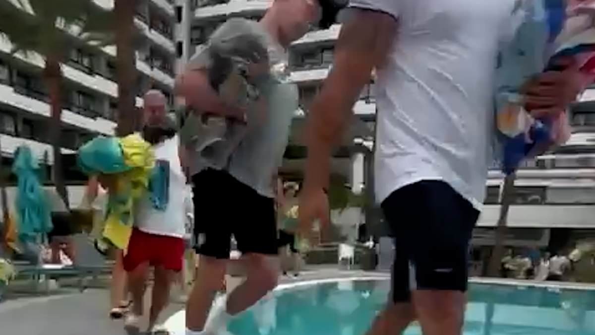 On your marks! Moment hotel worker is almost trampled as eager tourists are filmed racing to get sunbeds