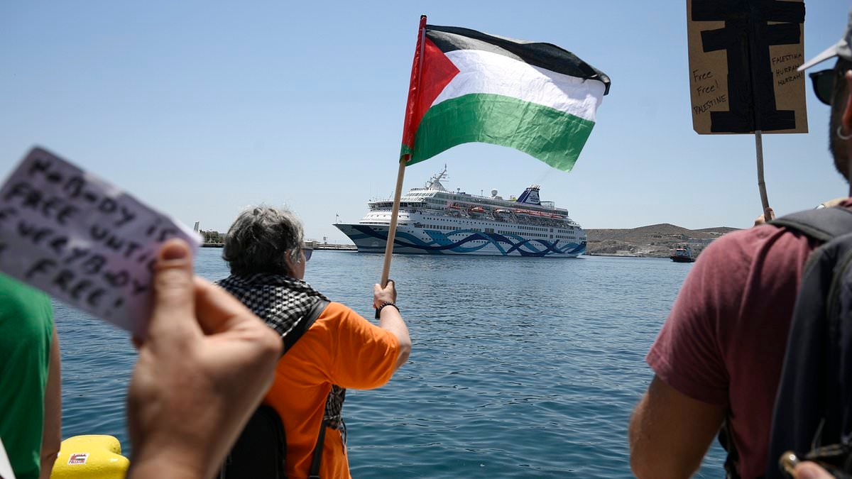 Moment pro-Palestine protesters block Israeli cruise ship passengers from disembarking on Greek island before vessel has to divert to Cyprus