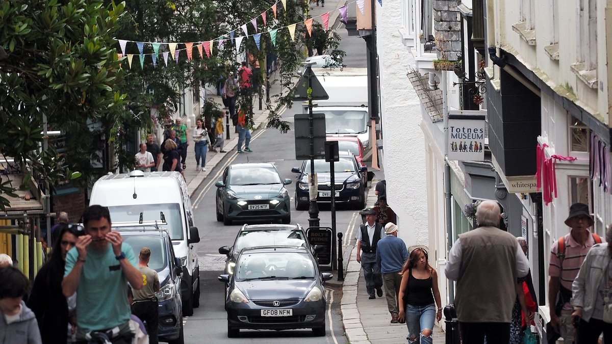 Is this Britain's SMUGGEST high street? Locals in market town boast everyone 'wishes' they had shops like theirs and claim it is 'creative capital of England'