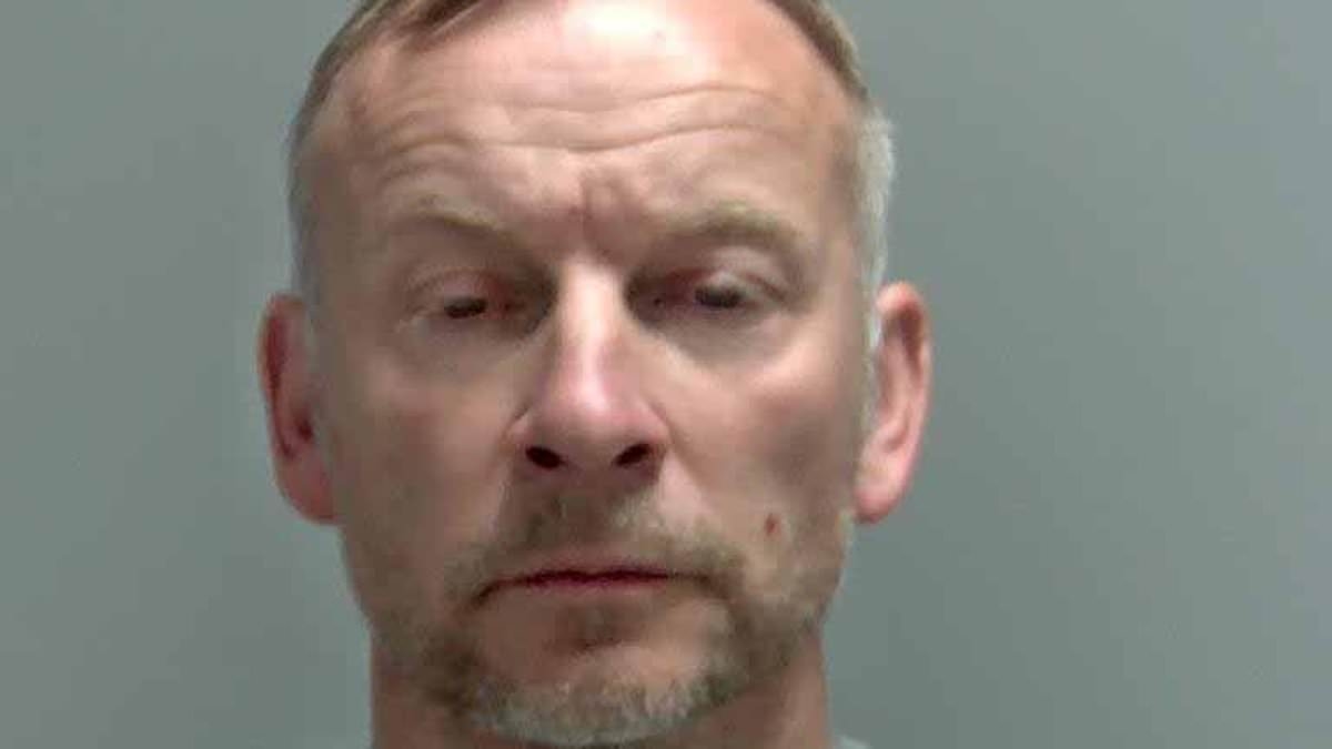Ex-Army Major who slashed ex-wife's throat with Stanley knife in 'chilling and vicious' attack over divorce settlement is jailed for 25 years