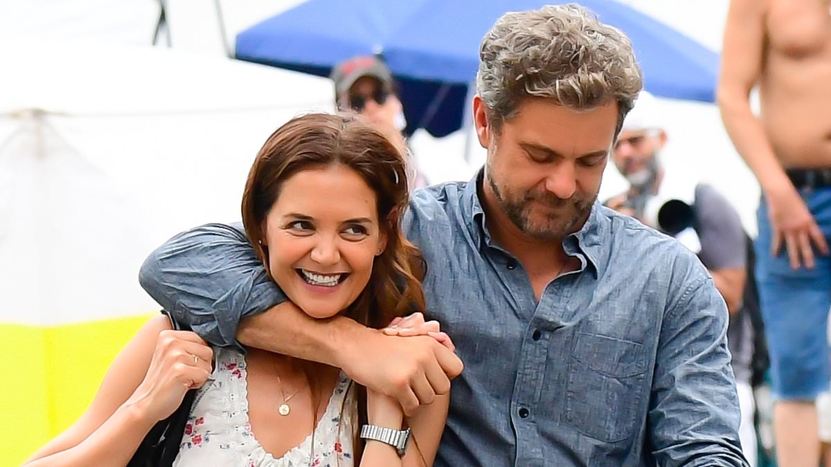 Katie Holmes cozies up to ex Joshua Jackson as they push a baby stroller through NYC during shoot for new film