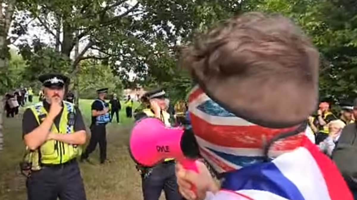 Angry protests erupt outside taxpayer-funded asylum hotel as demonstrators shout: 'Back in your rubber dinghies!'
