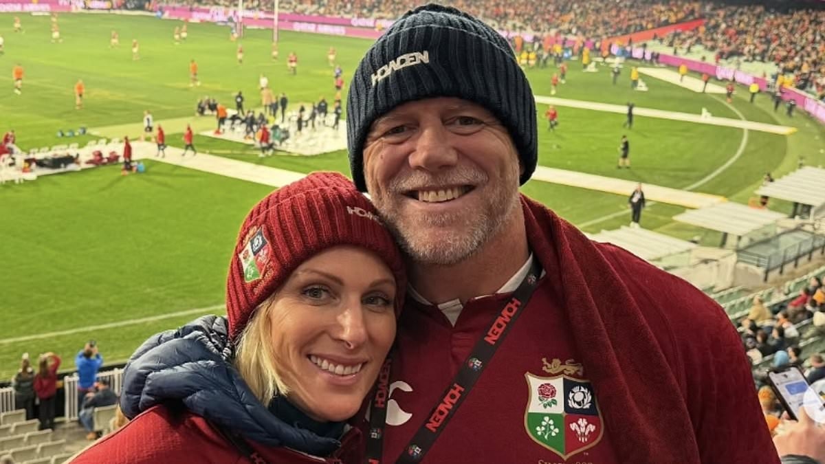 Meanwhile, at the rugby... Zara and Mike Tindall lark about as they cheer on British and Irish Lions in Melbourne