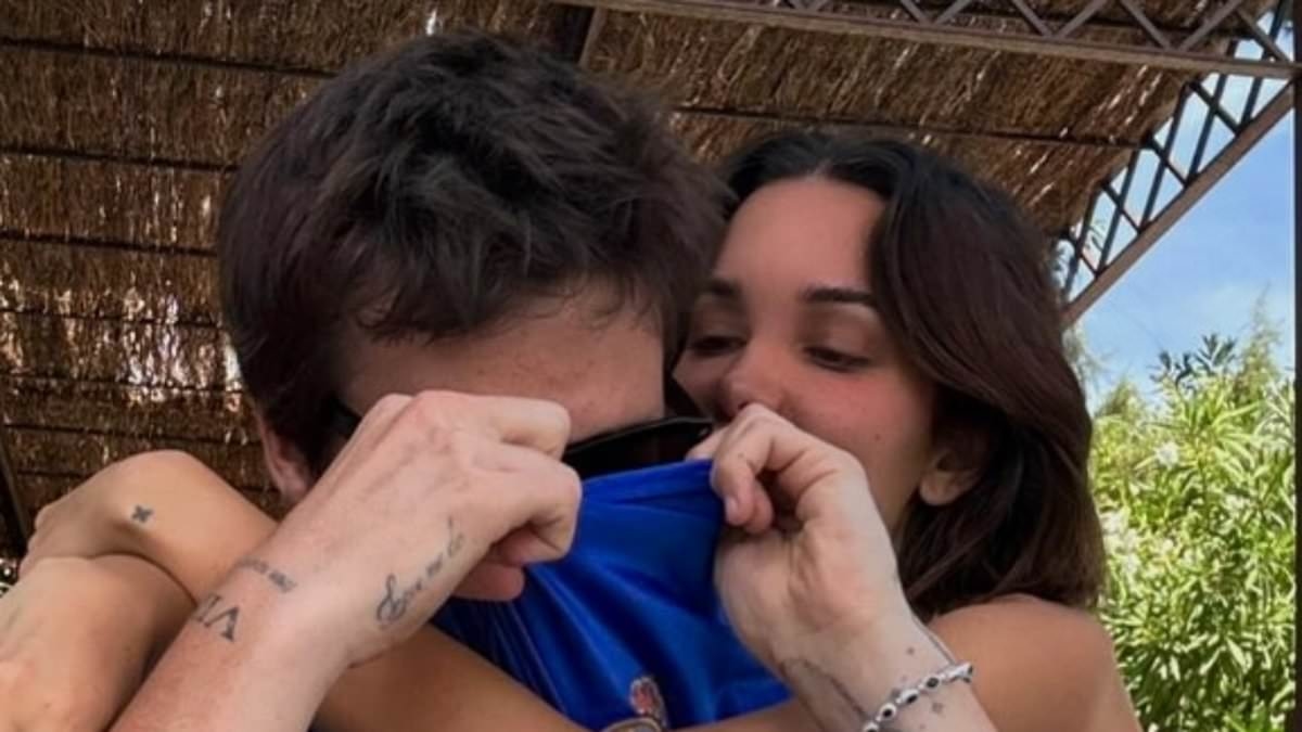 Cruz Beckham, 20, and his bikini-clad girlfriend Jackie Apostel, 30, turn up the heat in sultry PDA moment during French getaway