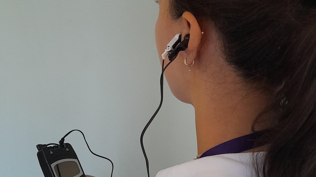 Zapping the brain with a tiny device on the ear could boost fitness without people having to lift a finger, study claims