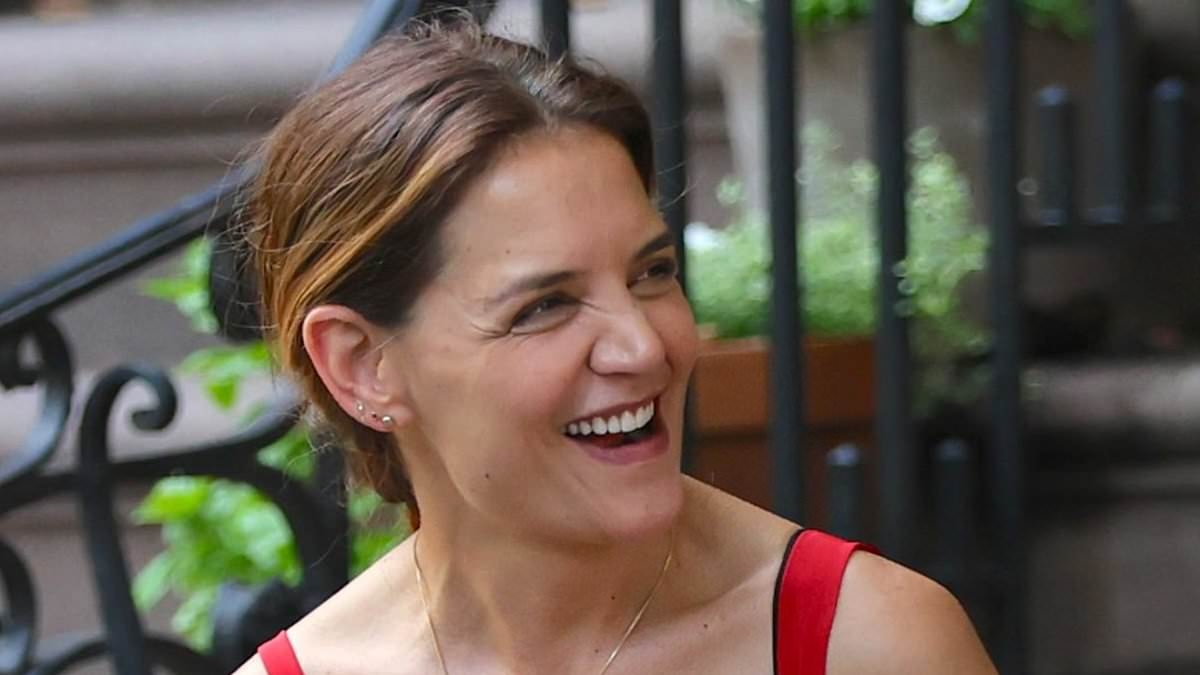 Katie Holmes beams at ex Joshua Jackson as they high-five on set of their new film in NYC - after reuniting 20 years on from Dawson's Creek