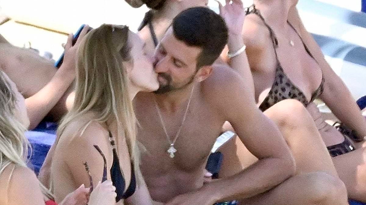 Novak Djokovic packs on the PDA with wife Jelena as duo enjoy kiss during luxury holiday - at Greek resort where champagne can cost £100,000!