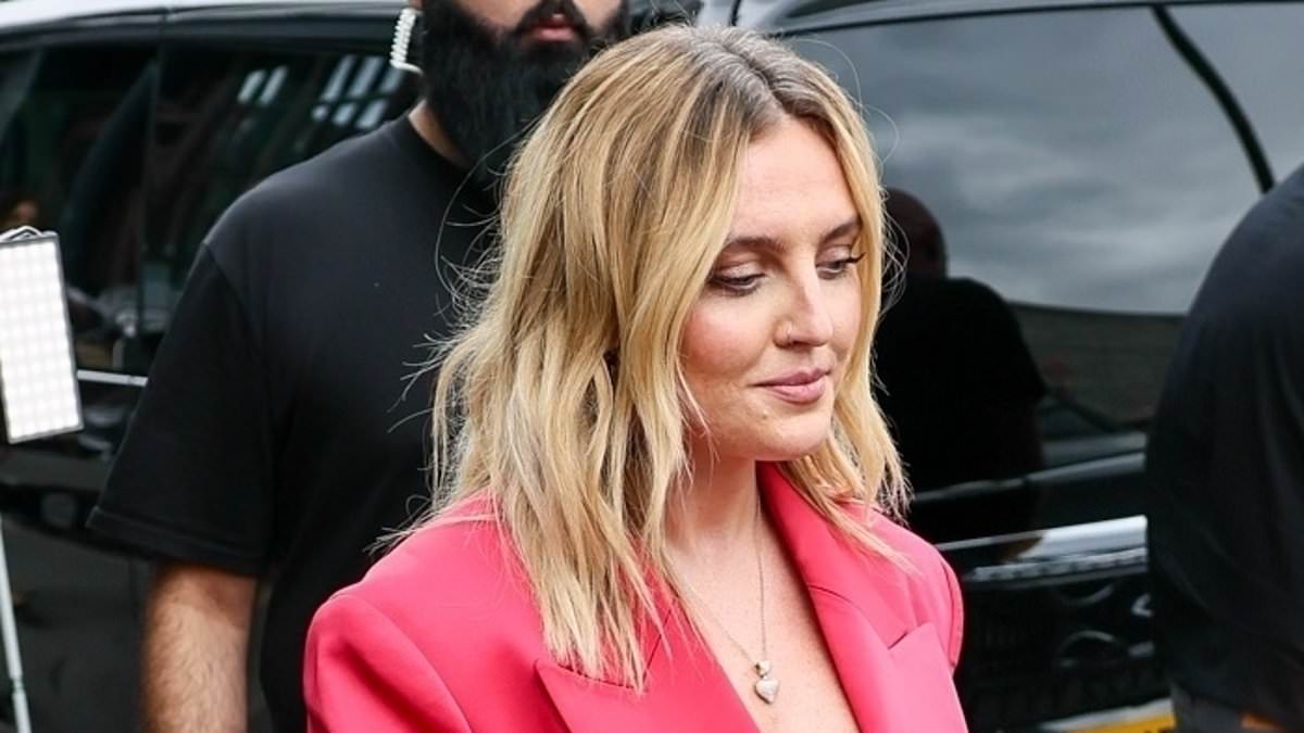 Perrie Edwards looks stylish in a plunging blazer dress after acoustic performance in London