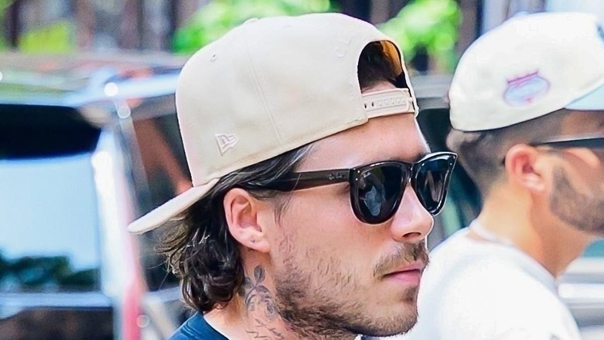 Brooklyn Beckham gets back to the grind: Glum hot sauce salesman joins Nicola Peltz shopping and heads for a family lunch with the in-laws