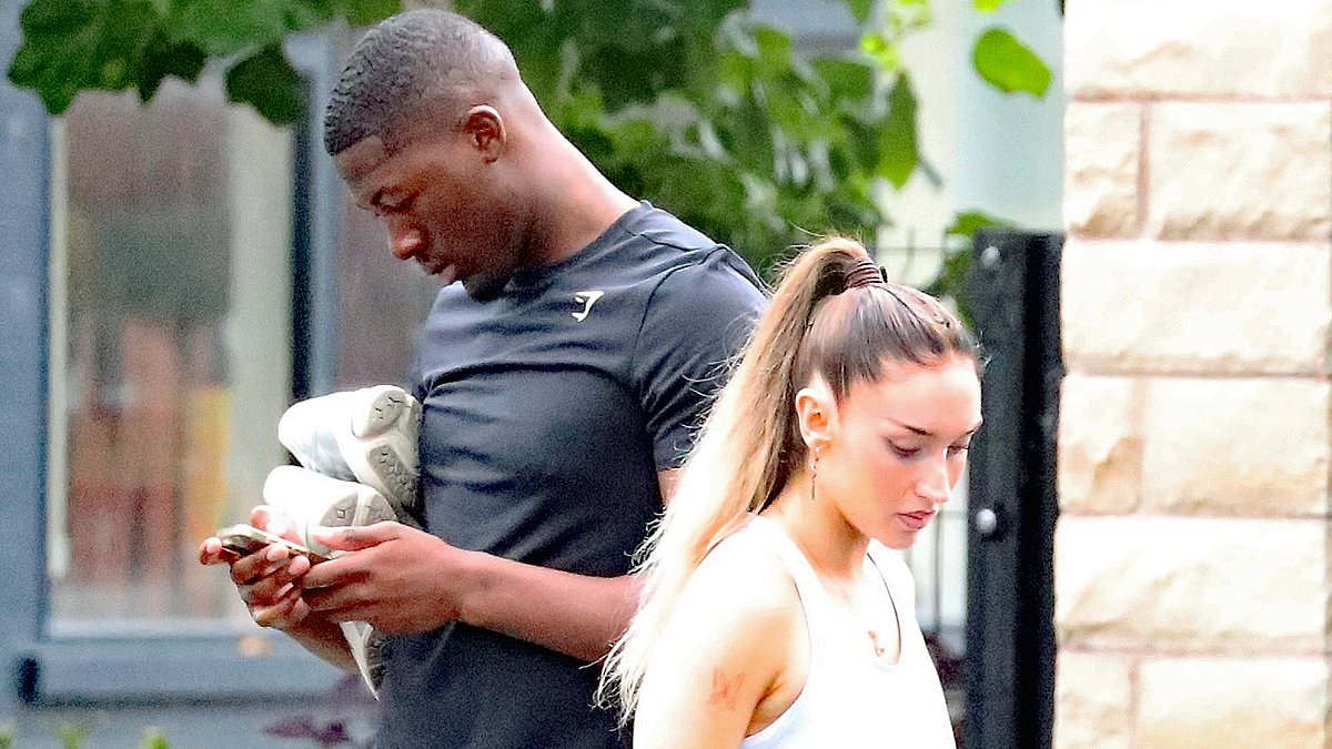 Love Island star Ayo Odukoya is seen with his new girlfriend who has a VERY famous England football icon as a father after confirming their romance