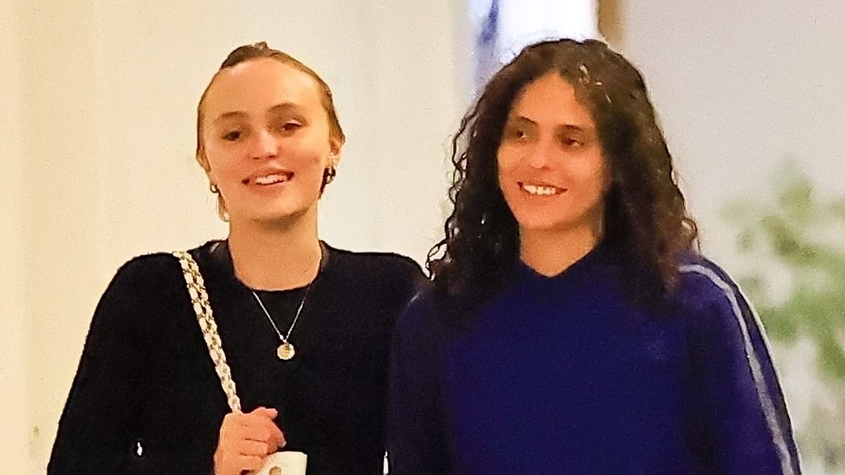 Johnny Depp's daughter Lily-Rose passionately kisses her girlfriend after celebrating two year anniversary
