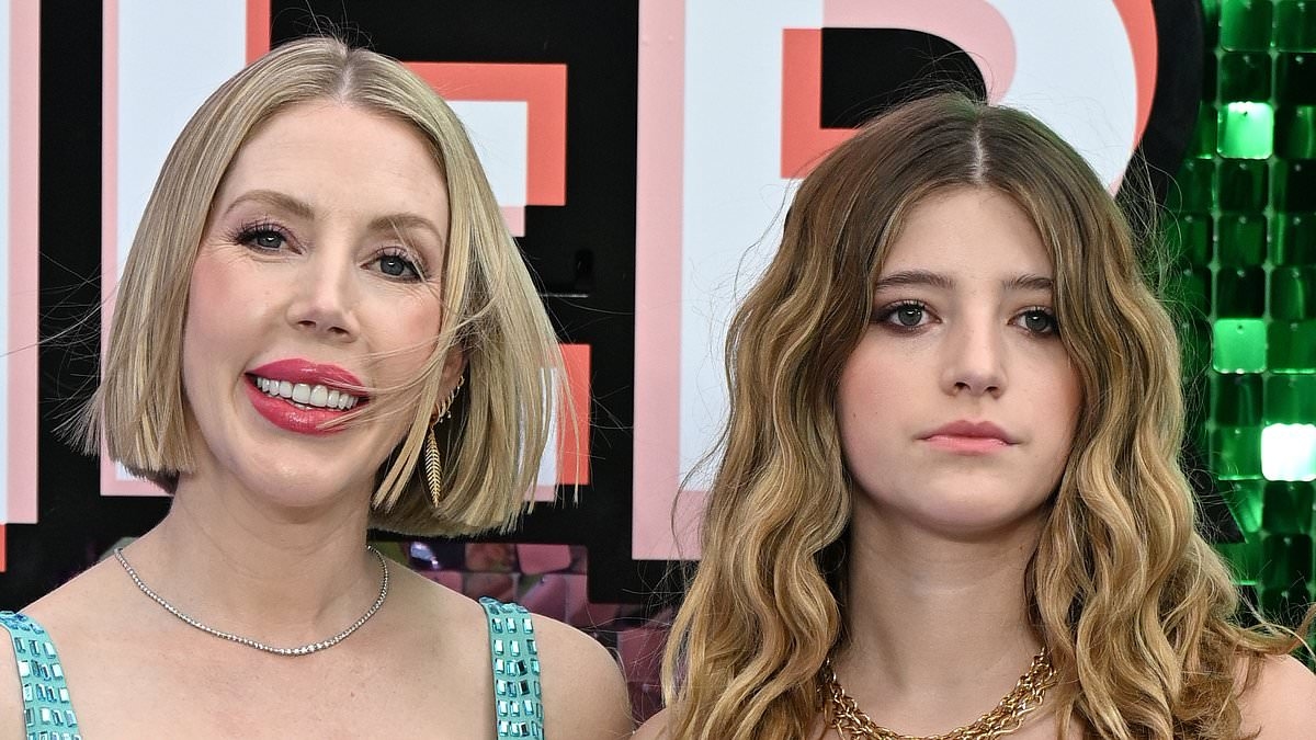 Pregnant Katherine Ryan shows off her growing bump in a dazzling turquoise dress as she attends the UK premiere of Freakier Friday with her daughter Violet, 16
