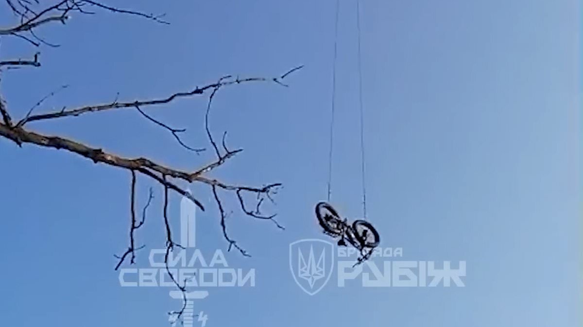 Moment wounded Ukrainian soldier escapes Russian forces... on an e-bike that was delivered by drone