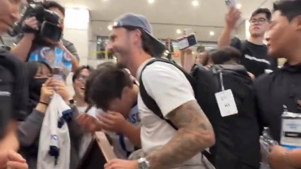 Moment South Korean Tottenham fan bursts into tears after meeting James Maddison - as captain Son Heung-min and team-mates receive rapturous welcome