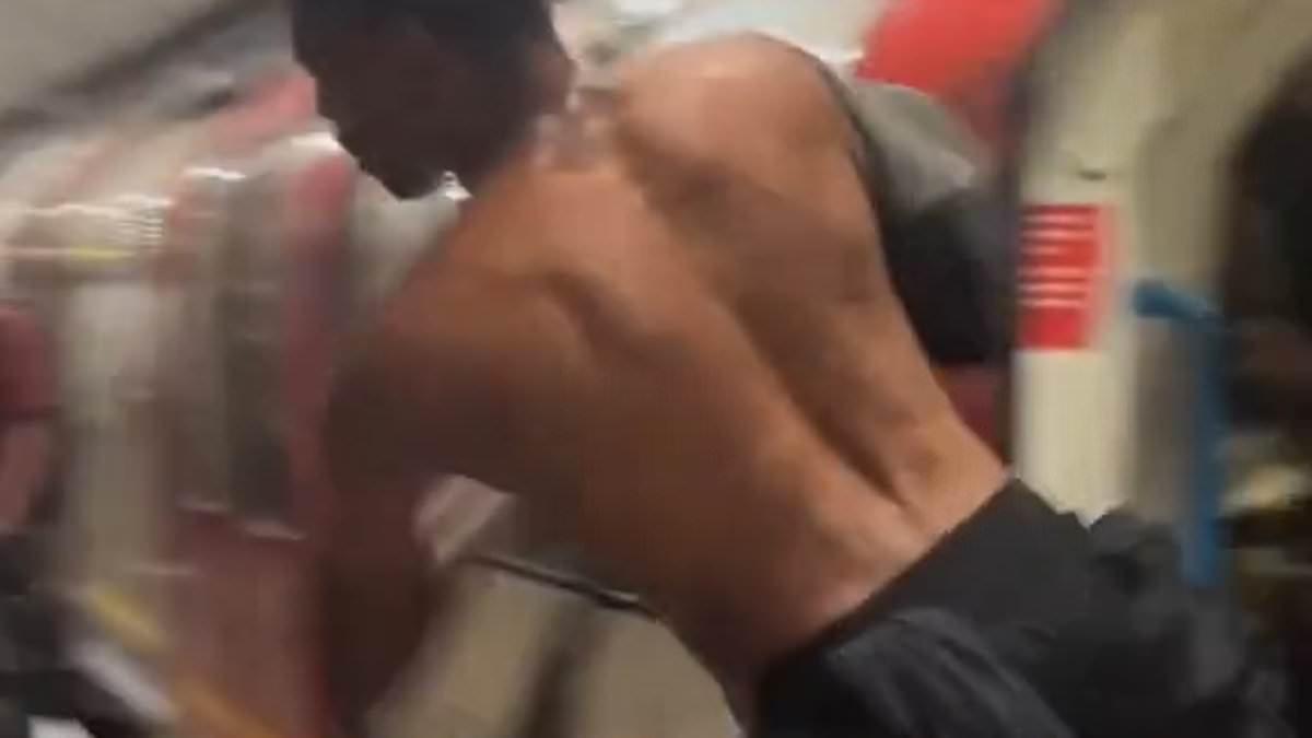 Terrifying moment Tube passenger KICKS window out so he can get off the train