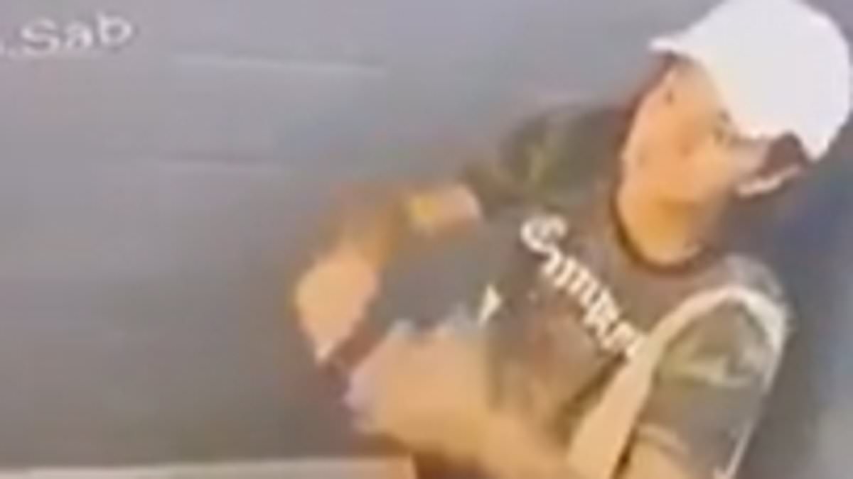 Hulking athlete filmed beating his girlfriend to a pulp moans that he's fearful for HIS safety in jail