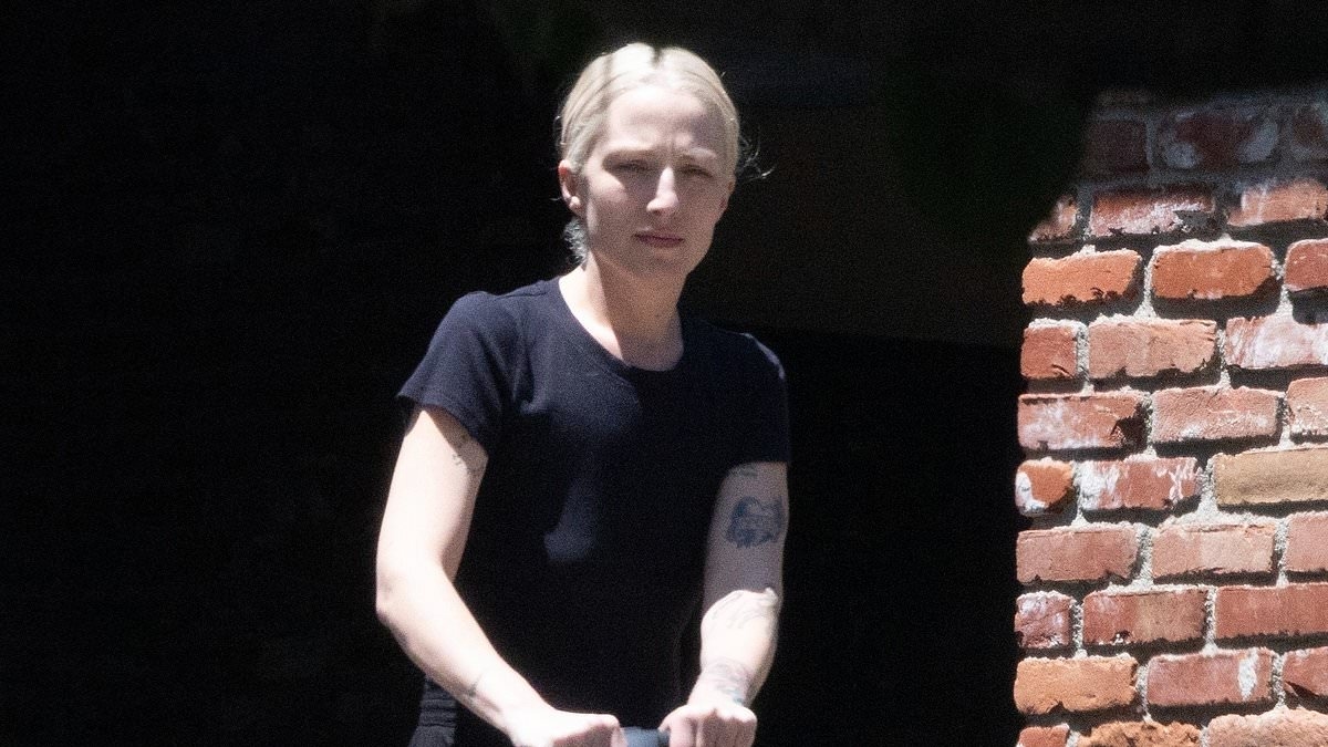 Dave Grohl's baby mama Jennifer Young steps out with their daughter on the eve of her first birthday