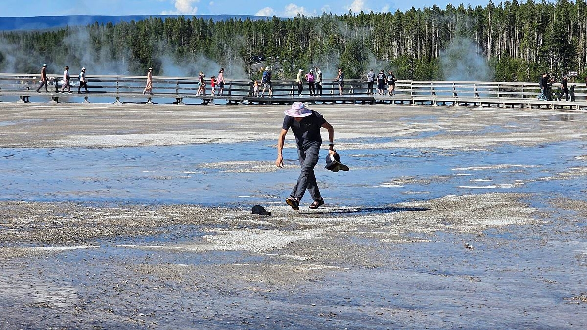 Outrage as idiotic Yellowstone tourist trespasses onto iconic colorful ecosystem near hot spring