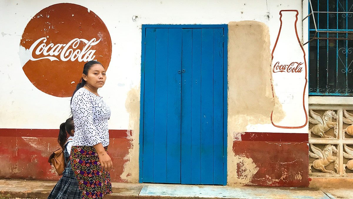 Inside the town addicted to Coca-Cola where residents drink 800L every YEAR and children are bottle-fed with soft drink for heartbreaking reason