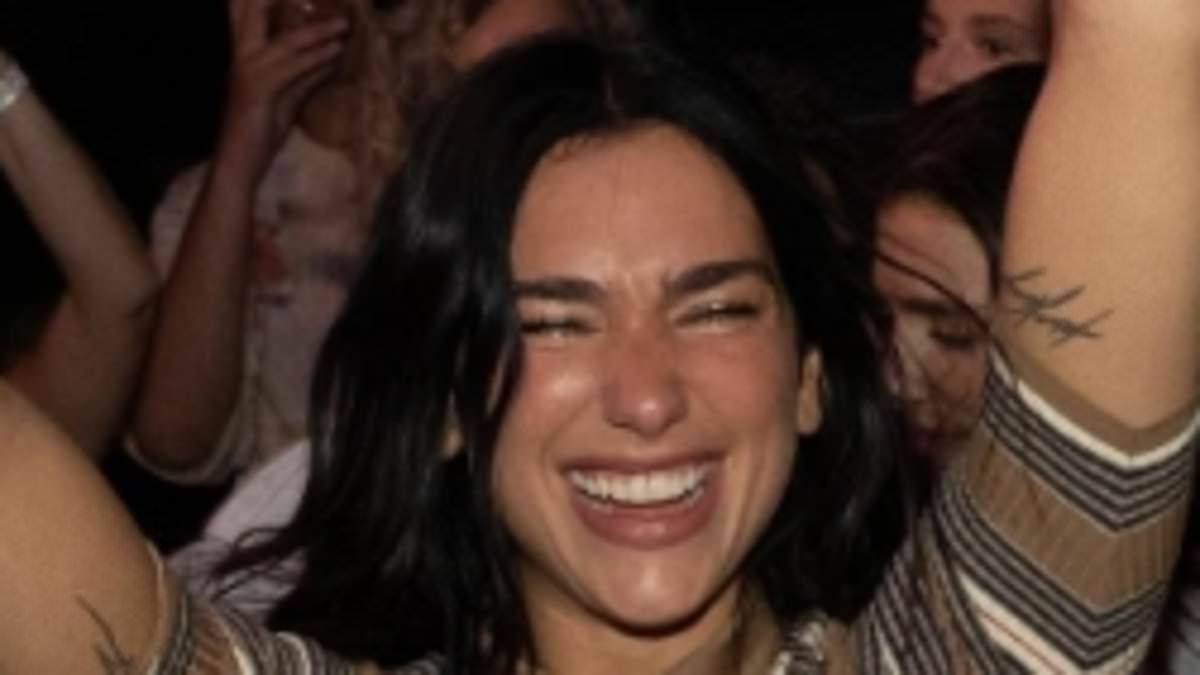 Dua Lipa cosies up to fiance Callum Turner as she parties the night away at Sunny Hill Festival to celebrate being granted her Kosovo citizenship