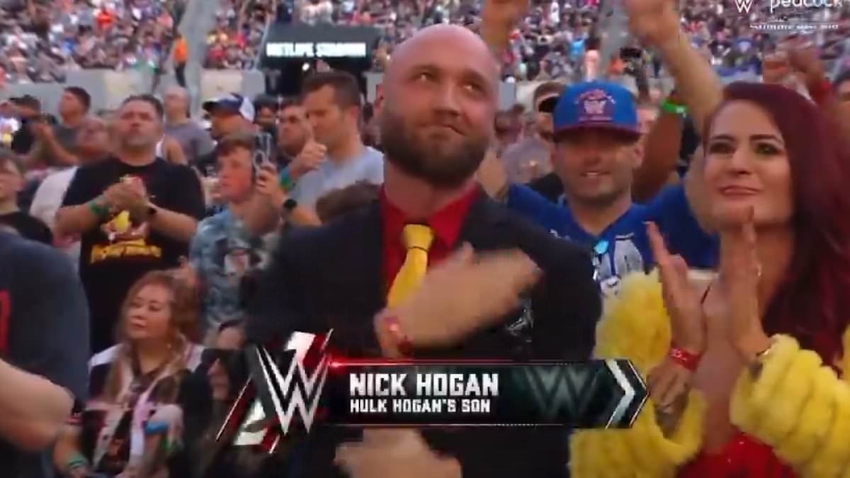 Hulk Hogan's devastated son Nick appears to fight back tears during emotional WWE tribute to late icon