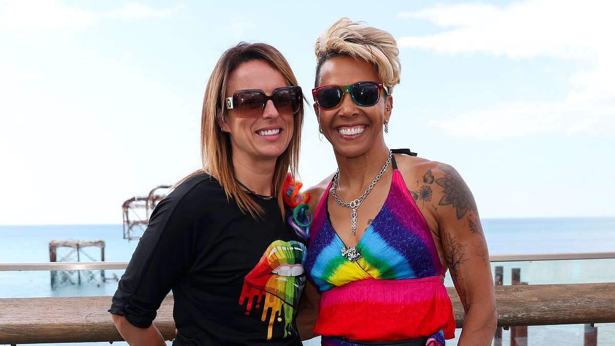Double Olympic champion Dame Kelly Holmes 'is engaged to her long-term girlfriend Louise Cullen three years after coming out'
