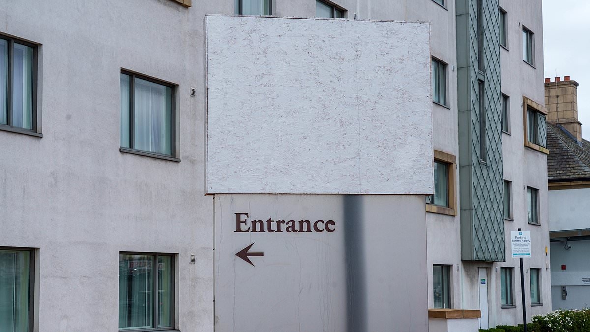 Four-star migrant hotel covers up Hilton branding after protesters targeted previous buildings
